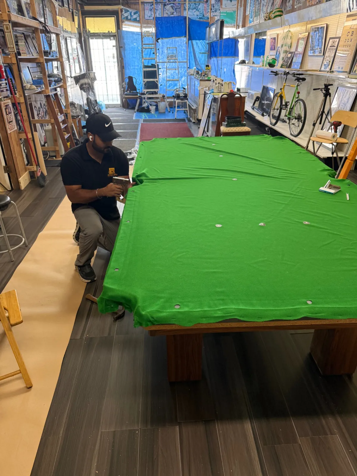Pool table cloth stretched during reassembly