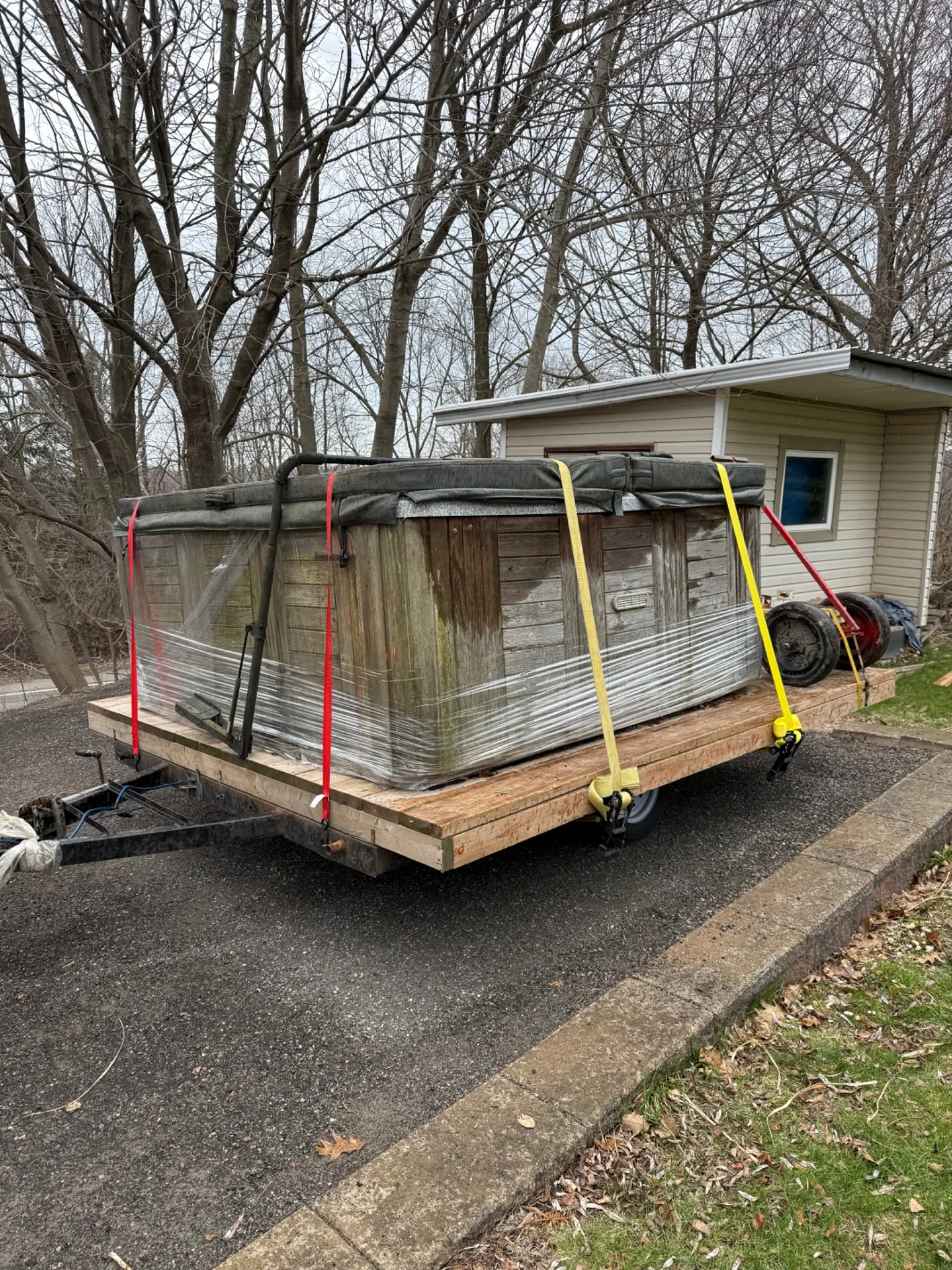Hot tub transported from Port Elgin Ontario to London Ontario on a dedicated flatbed trailer by Gypsee Movers.