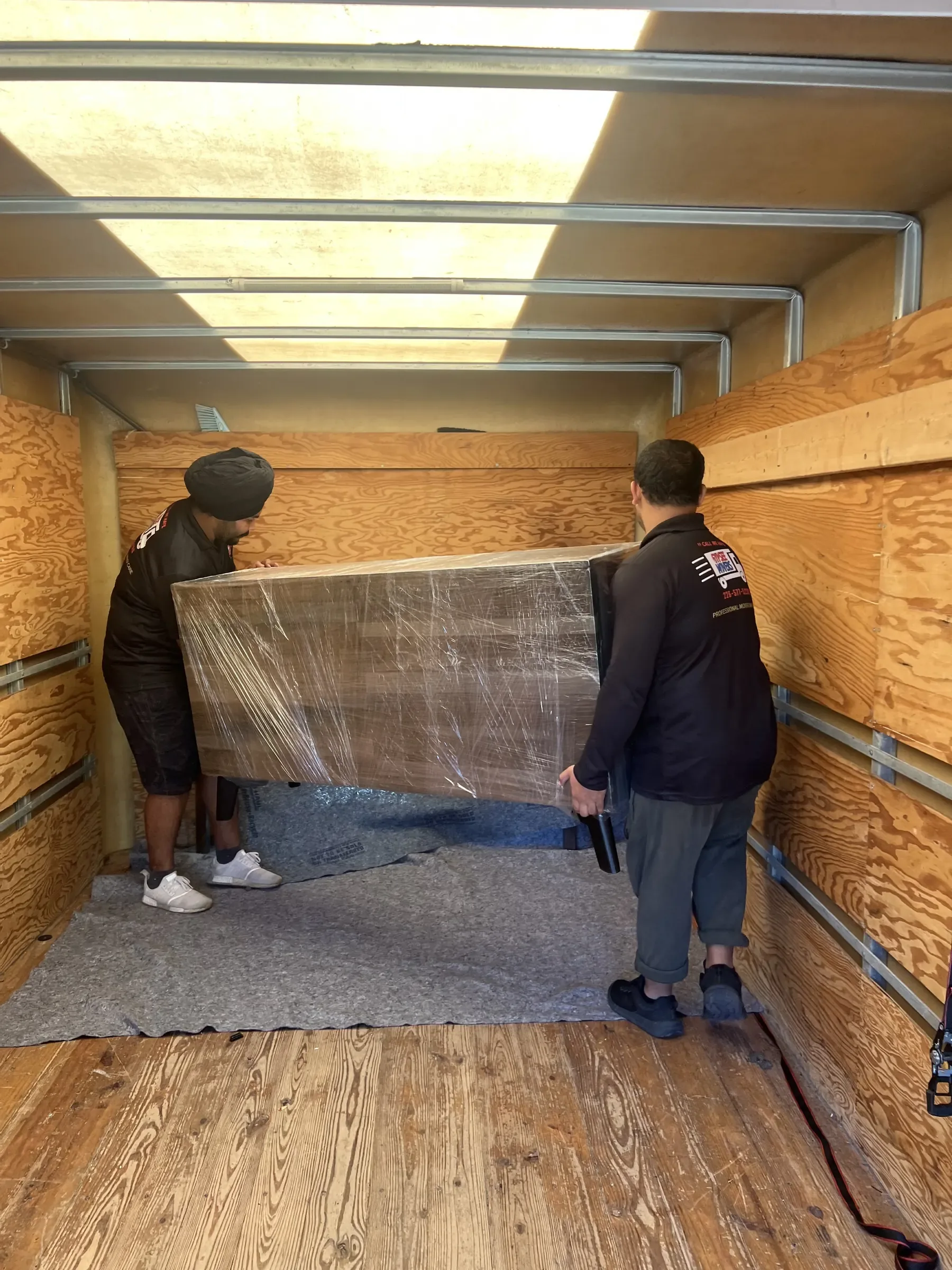 Wrapped furniture prepared for a local move by Gypsee Movers