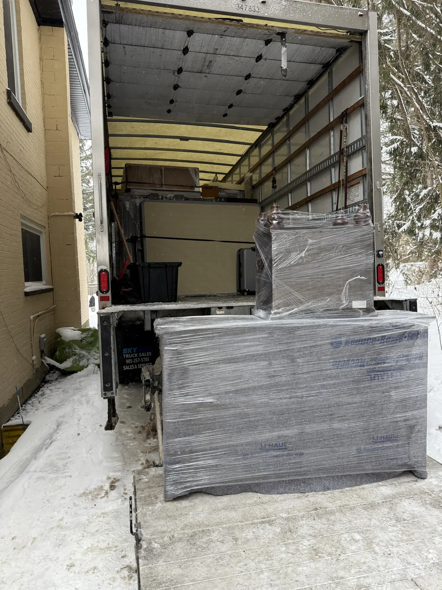Wrapped furniture prepared for loading during a long-distance move
