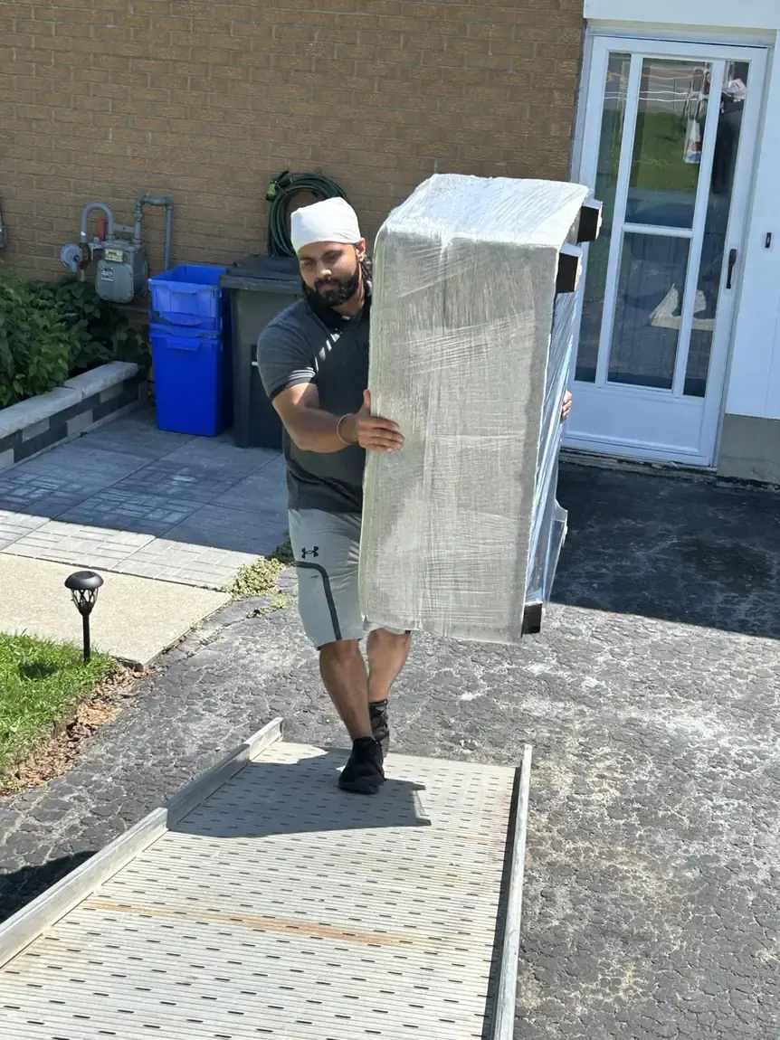 Carry to the truck and load - Gypsee Movers moving day process