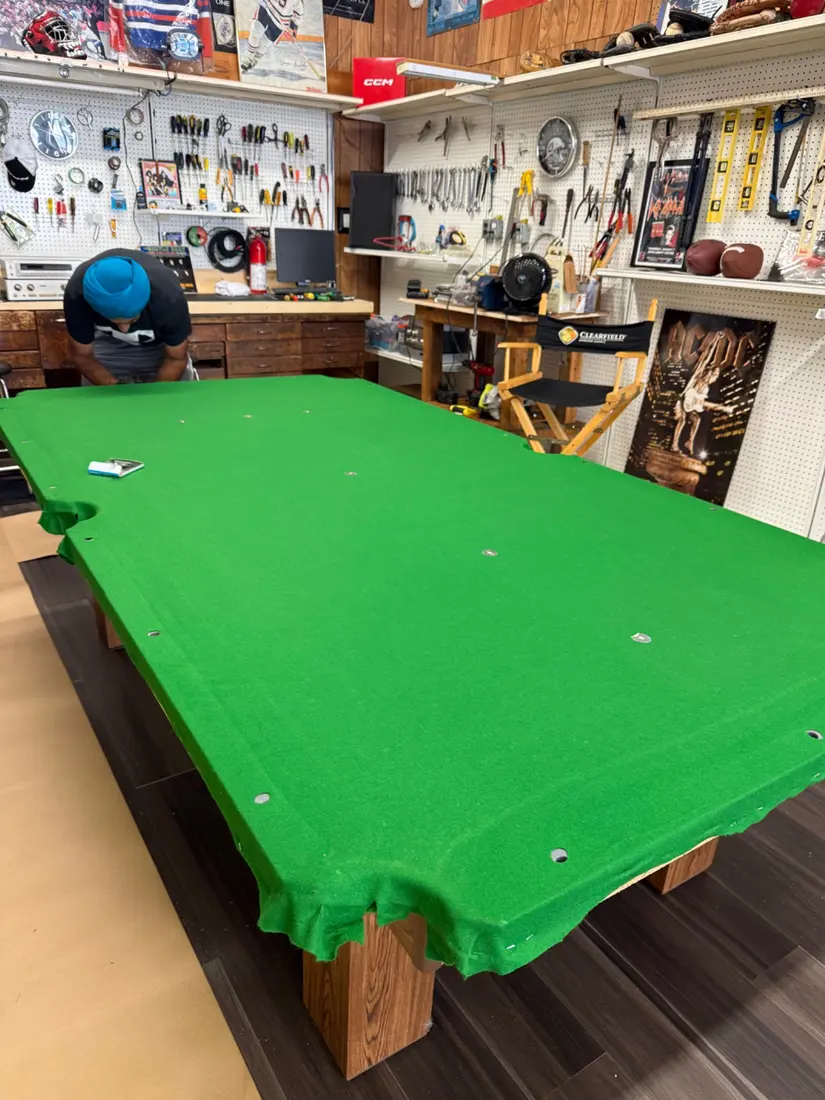 Fitting green pool table cloth in Sarnia