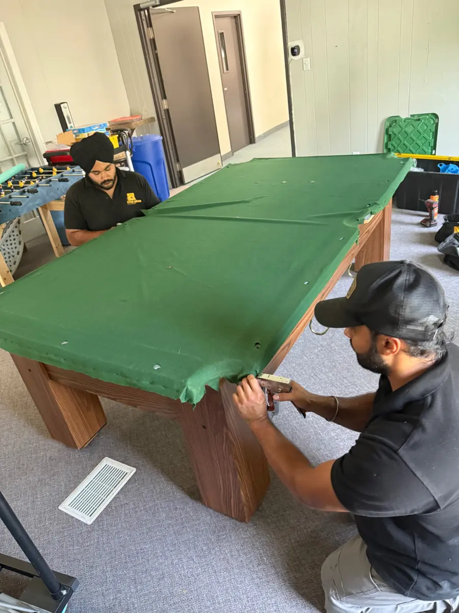 Stapling pool table felt
