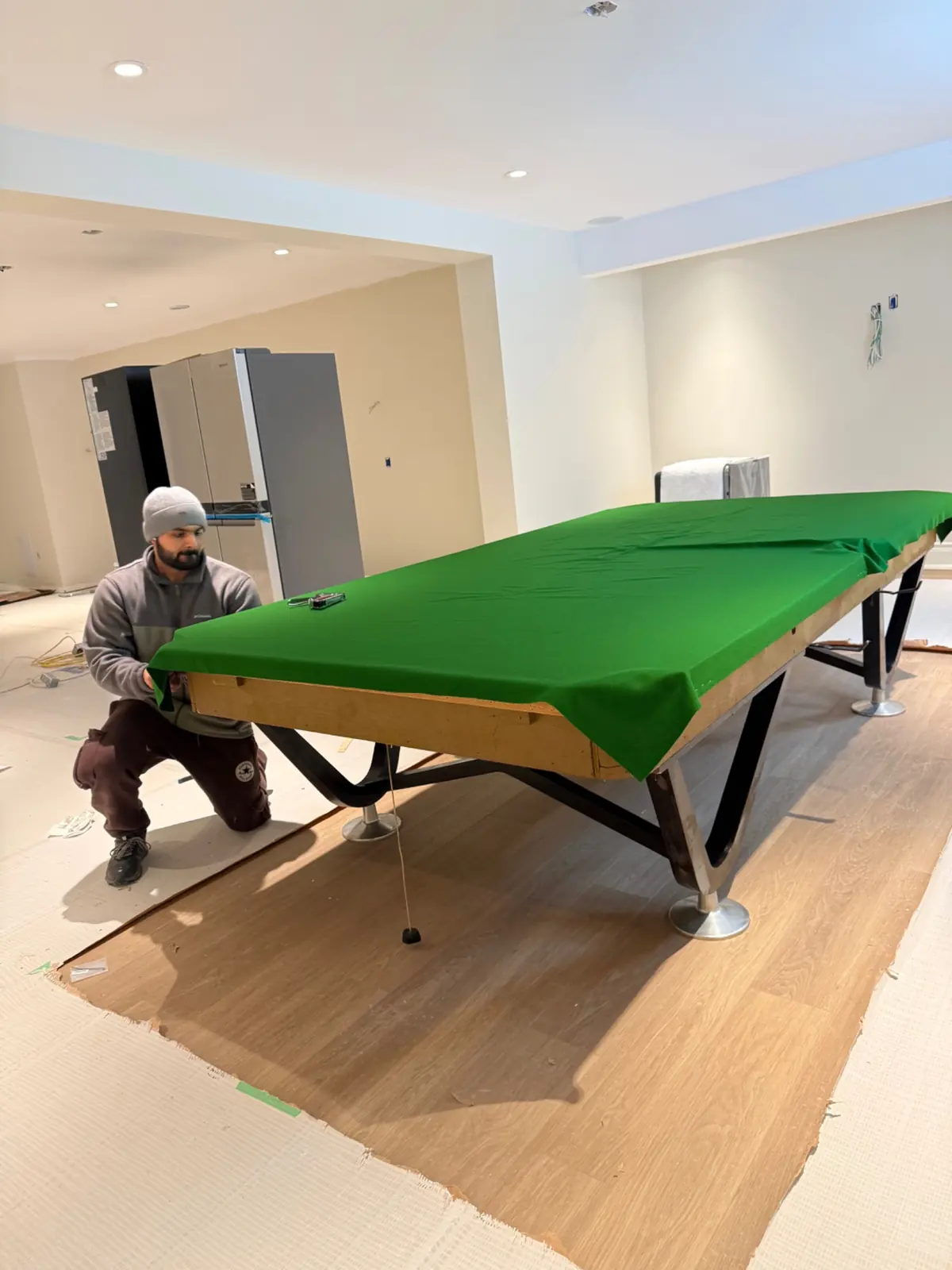 Pool table slate refelting in progress