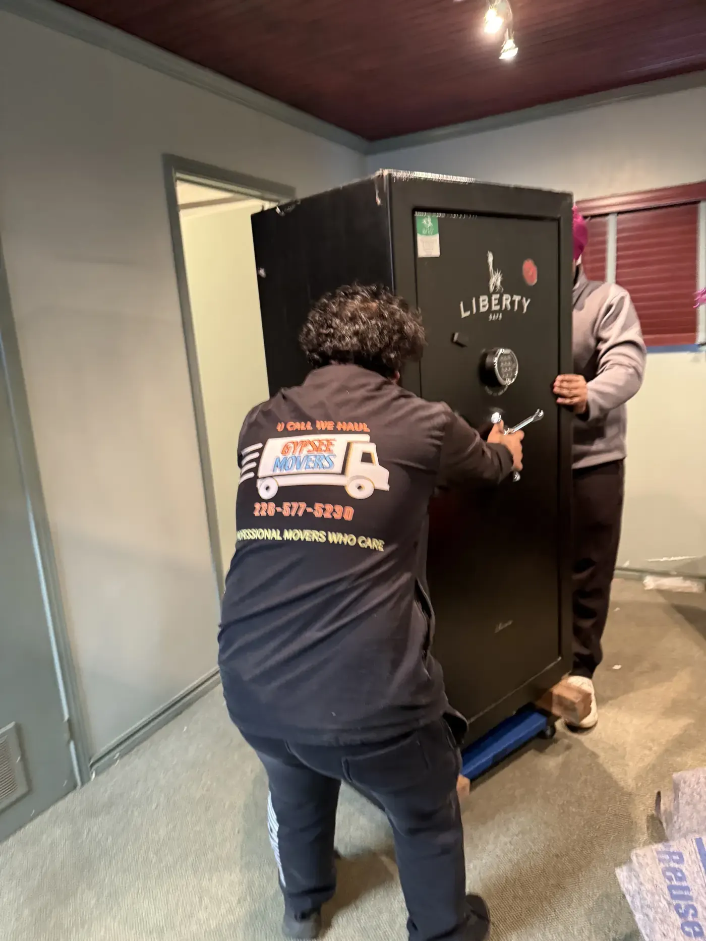 Gypsee Movers packing kitchen items for a residential move in London Ontario